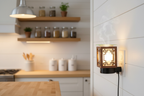 Antique square wood wall plug-in oil warmer in farmhouse kitchen wall outlet glowing warm
