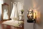 Silver leaf wall plug-in oil burner in bridal dressing room with wedding dress and roses