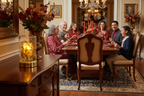 Multigenerational Latino family dinner with Gold Flower Glass Fragrance Oil Warmer