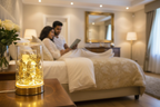 Romantic bedroom scene with South Asian couple and Gold Flower Glass Fragrance Oil Warmer
