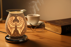 Bible and White Angel Wings oil burner in foreground on home desk